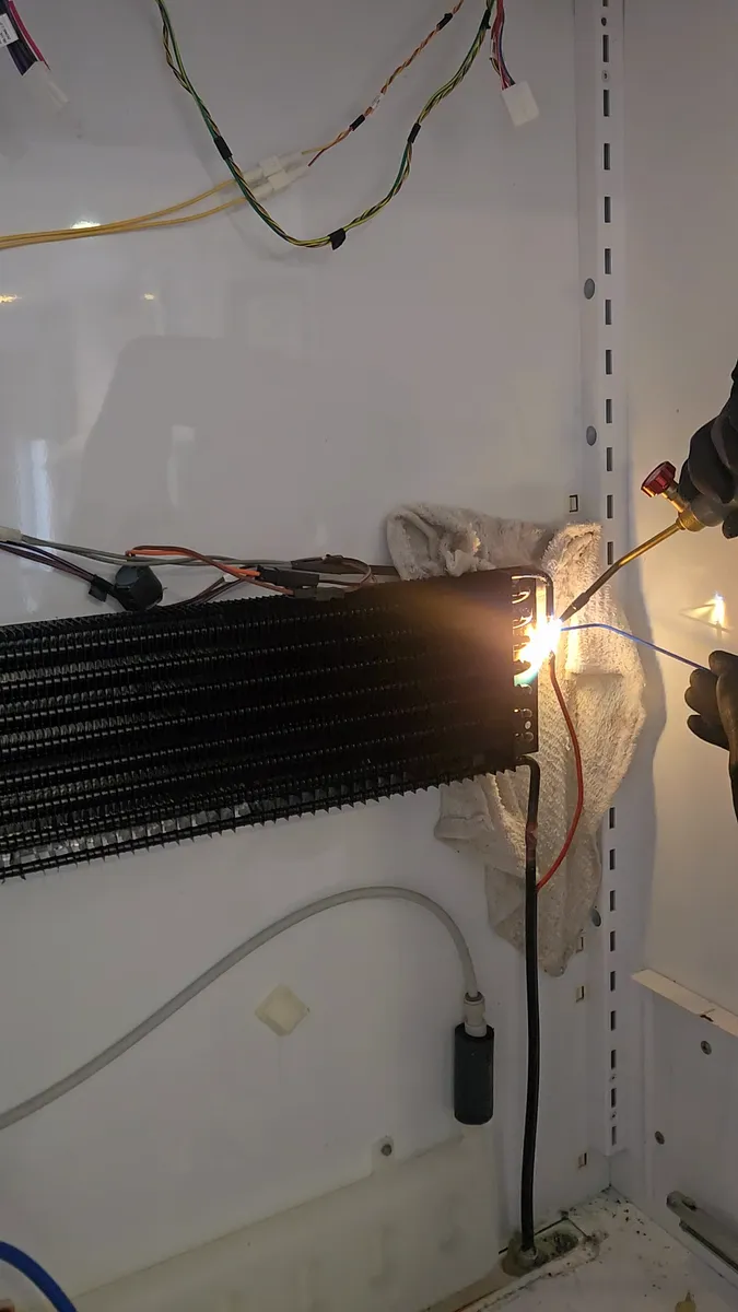 Brazing the capillary line during refrigerator evaporator replacement