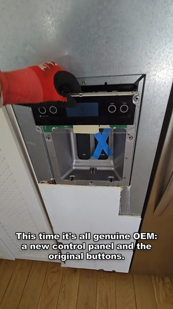 New OEM control panel and button membrane installed in the dispenser housing