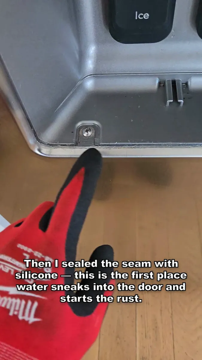 Silicone sealing the door seam where water enters the dispenser housing