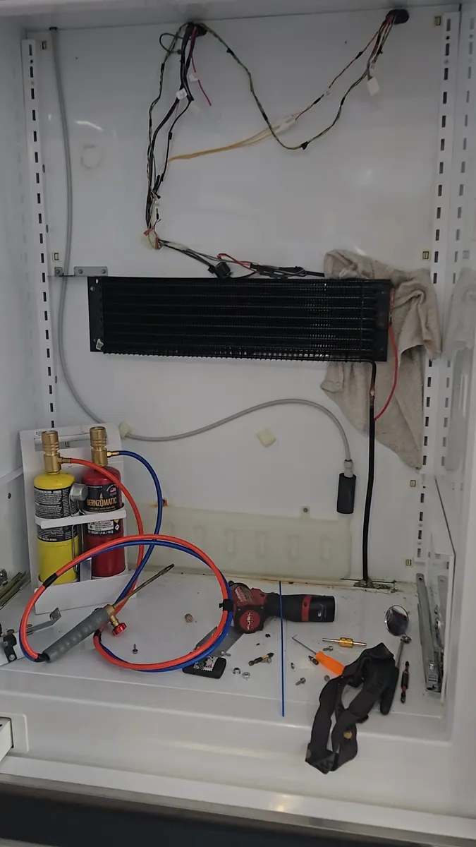 New evaporator installed during the sealed-system rebuild of the Viking refrigerator