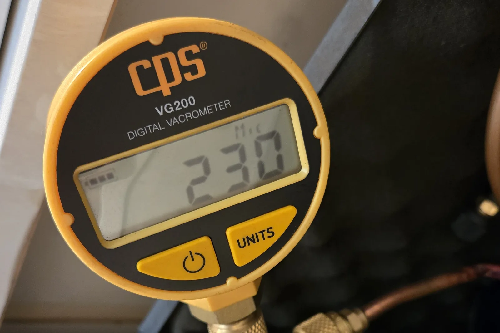 Micron gauge reading 230 microns during the deep vacuum on the refrigerator sealed system