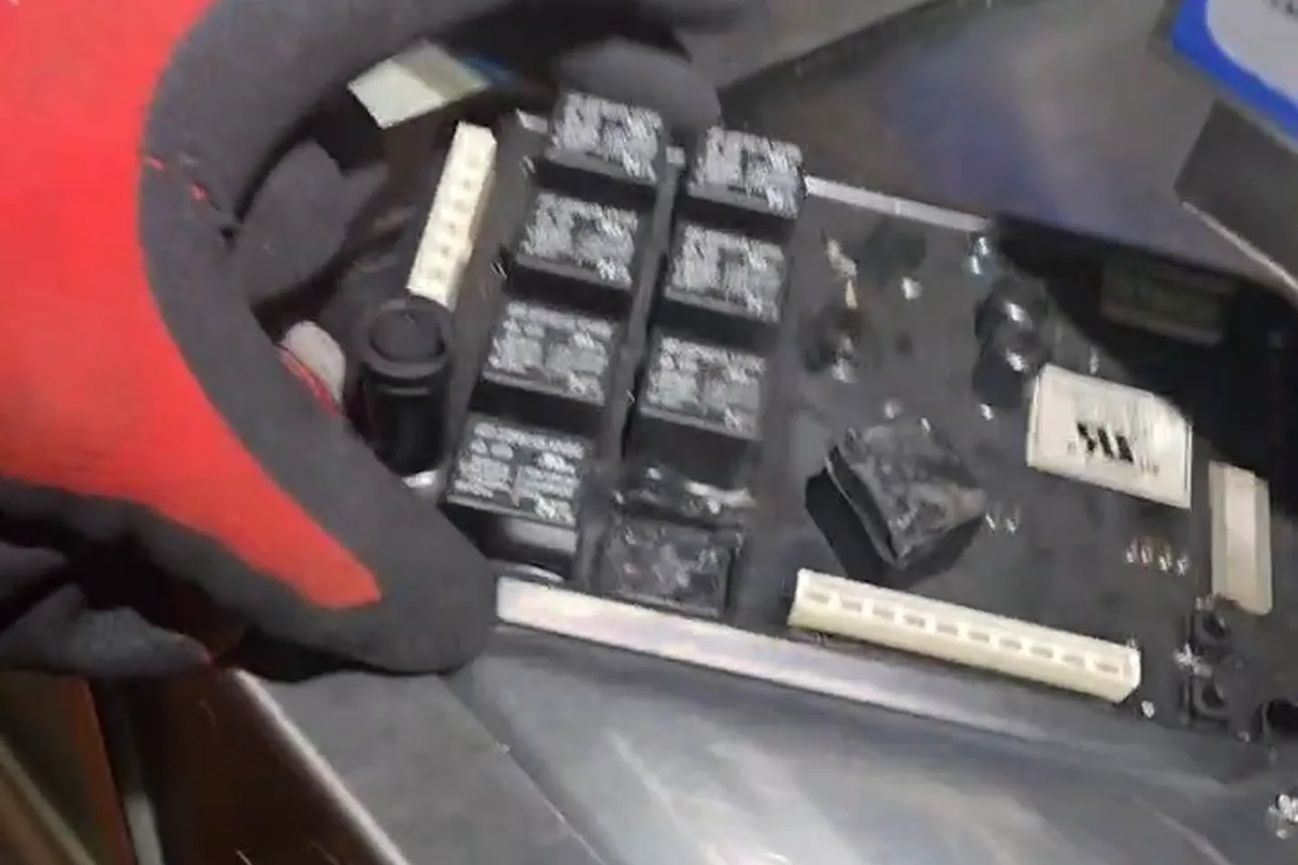 Burned relay and timer board from a commercial TempStar dishwasher with visible heat damage