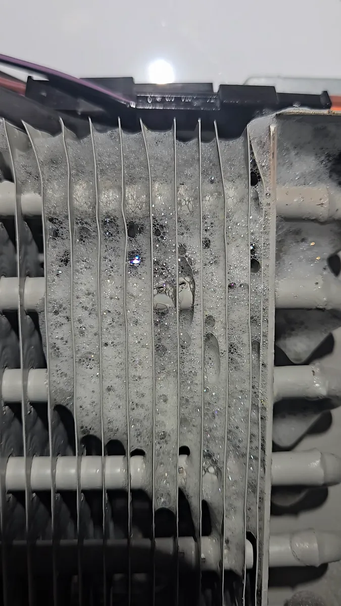 Leak-detect foam on the evaporator of a Viking built-in refrigerator during refrigerant leak diagnosis in Los Angeles