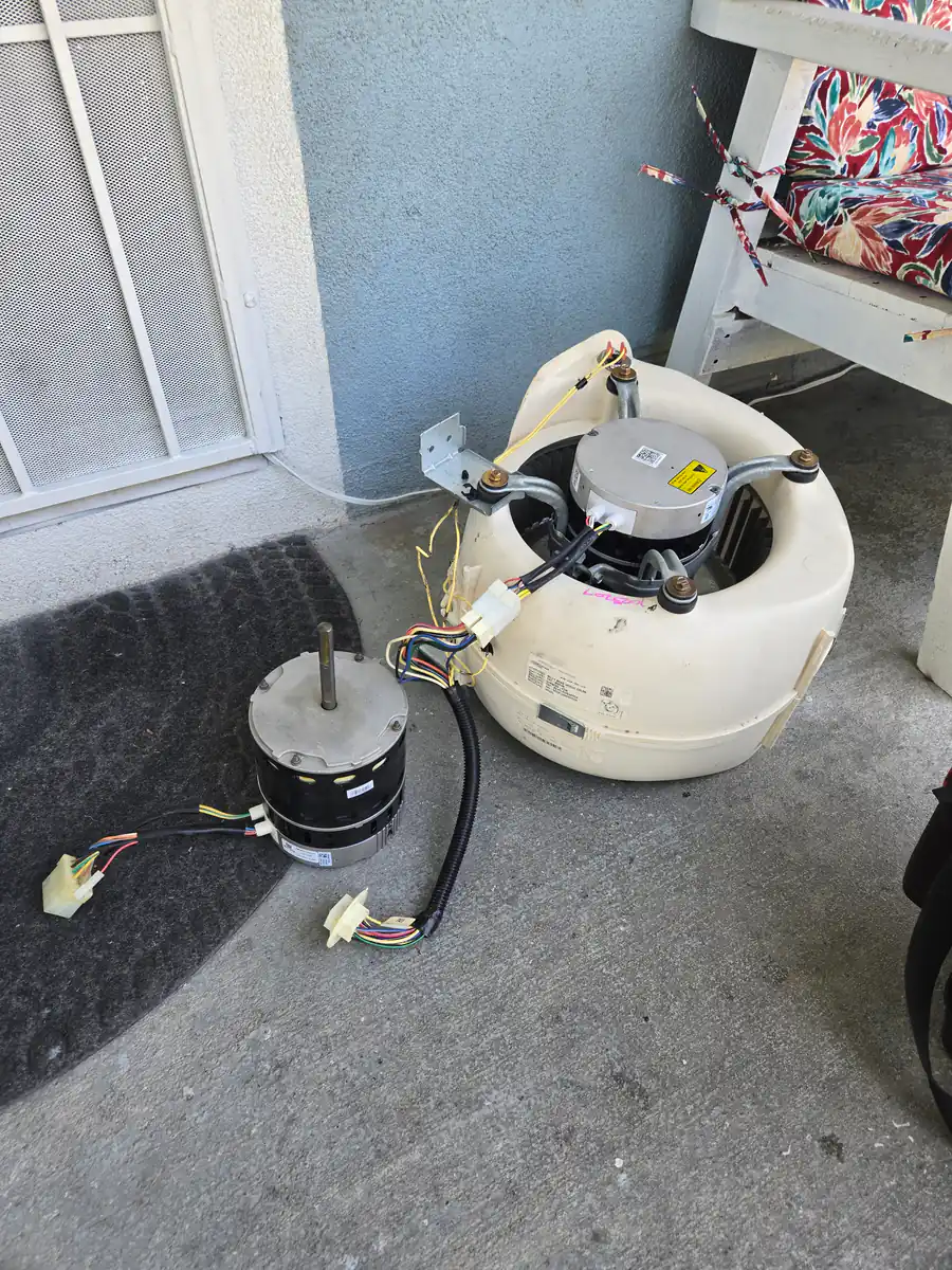 ECM blower motor removed beside the blower assembly during an Epic Star service visit in the Toluca Lake area