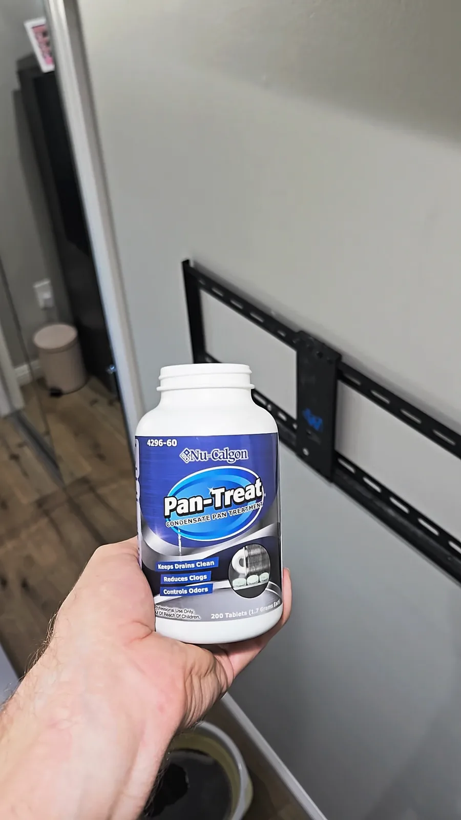 A jar of Pan-Treat drain pan tablets