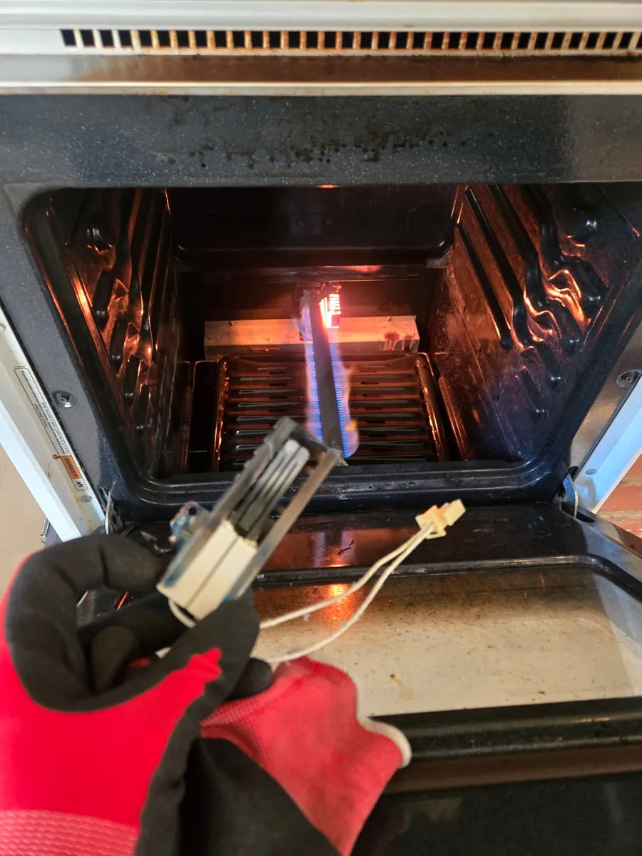 Epic Star technician testing a steady blue flame after replacing a gas oven igniter in Santa Monica, CA