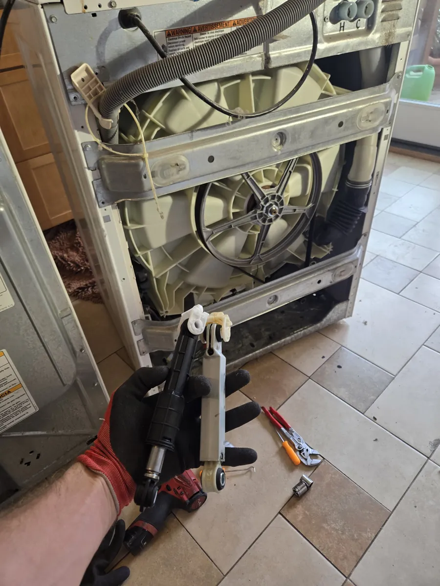 Washer shock absorber replacement on an older washing machine by Epic Star in Culver City, CA